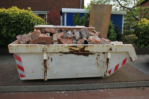 Professional loft clearance team working in a Balham home