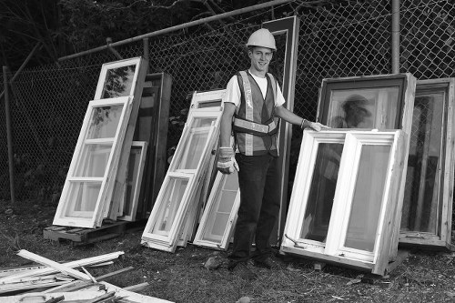 Professional builders waste clearance team at work in Balham