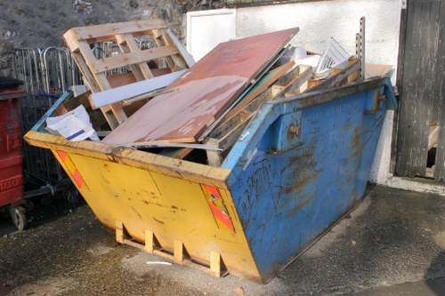 Waste collection truck operating in Balham