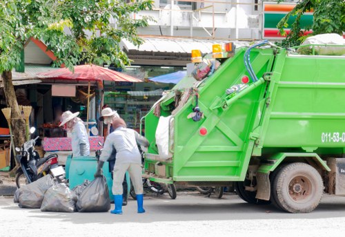 Business professionals discussing waste management solutions in Balham