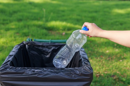 Recycling bins and sorted waste materials